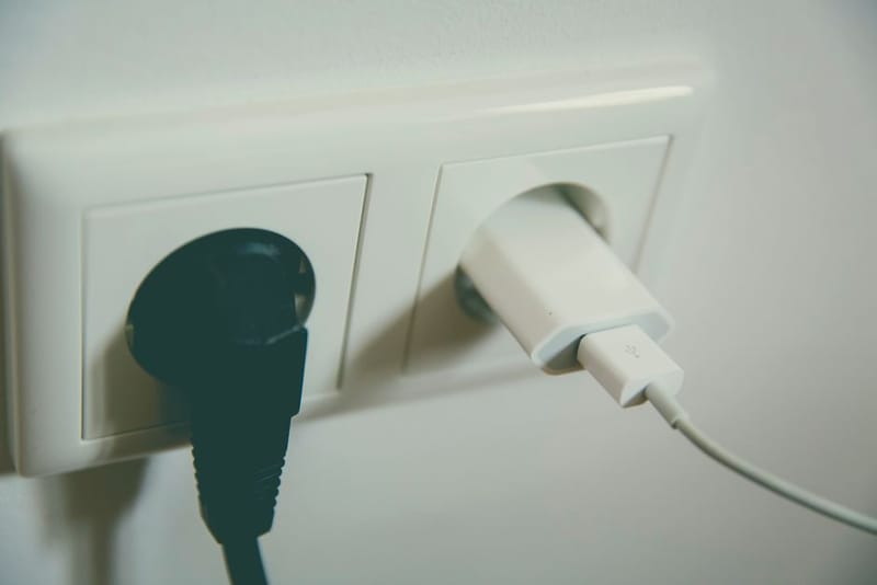 Compact smart plug with energy monitoring in a UK wall socket
