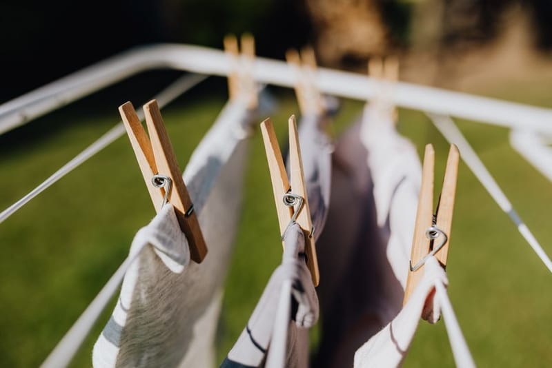 Washing drying indoors on an airer in a small flat